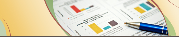 Picture of bar charts and a blue pen