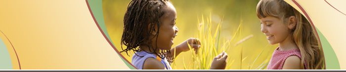 Picture of two girls playing on a meadow
