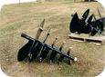 An auger can be used for smaller plantings.