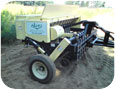 A Truax seeder which can plant several types of grass and forb seeds simultaneously.